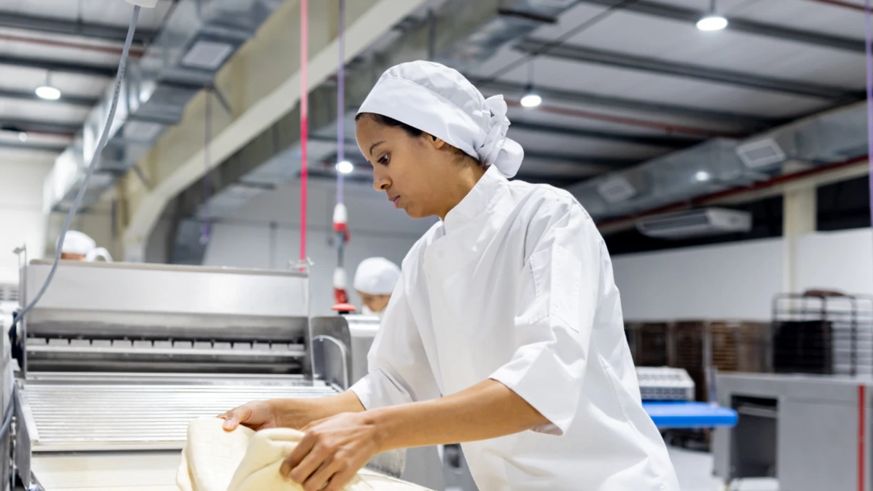 Woman_in_factory_making_dough