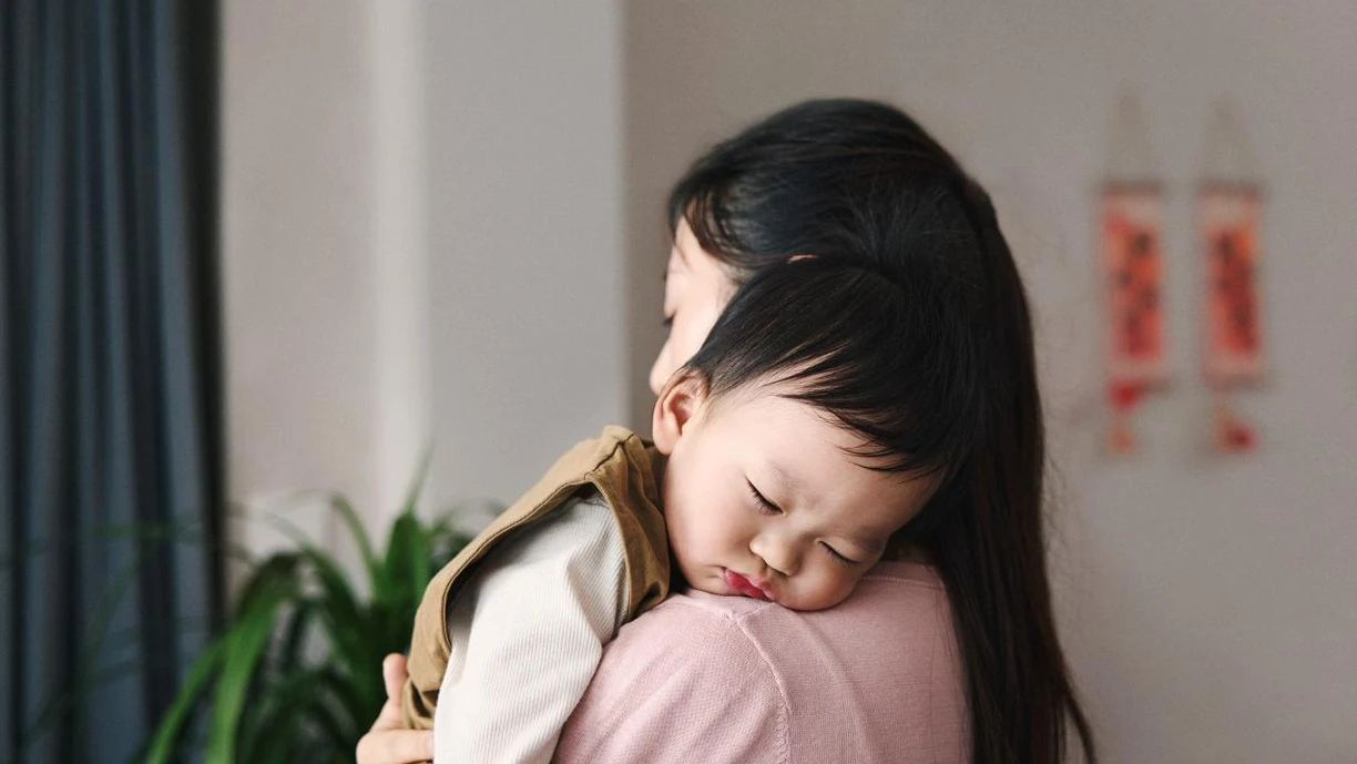 mother son embrace living room