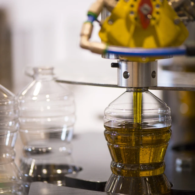 Oil bottle being filled up