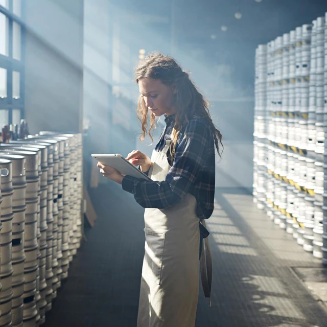 Brewer looking at note