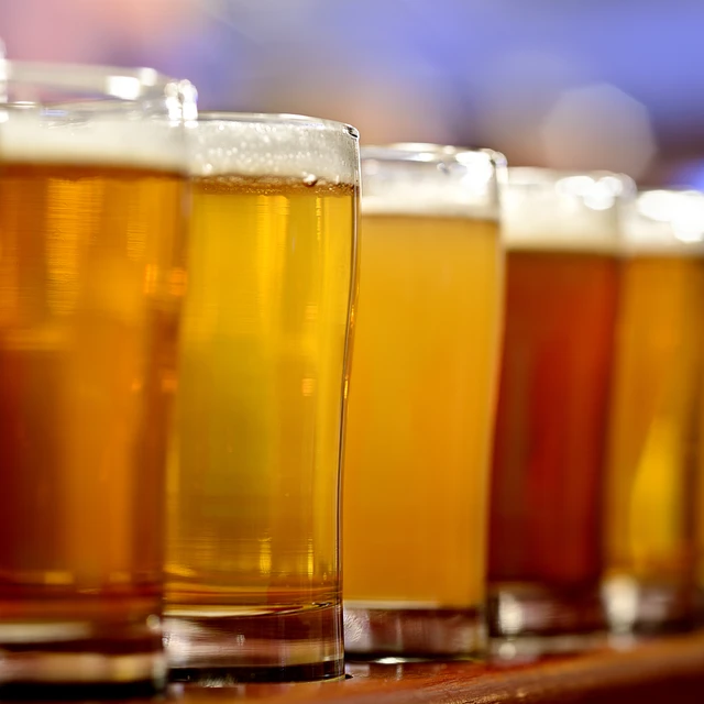 Row of different types of beer closeup