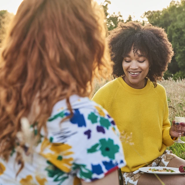 Friends talking with beer
