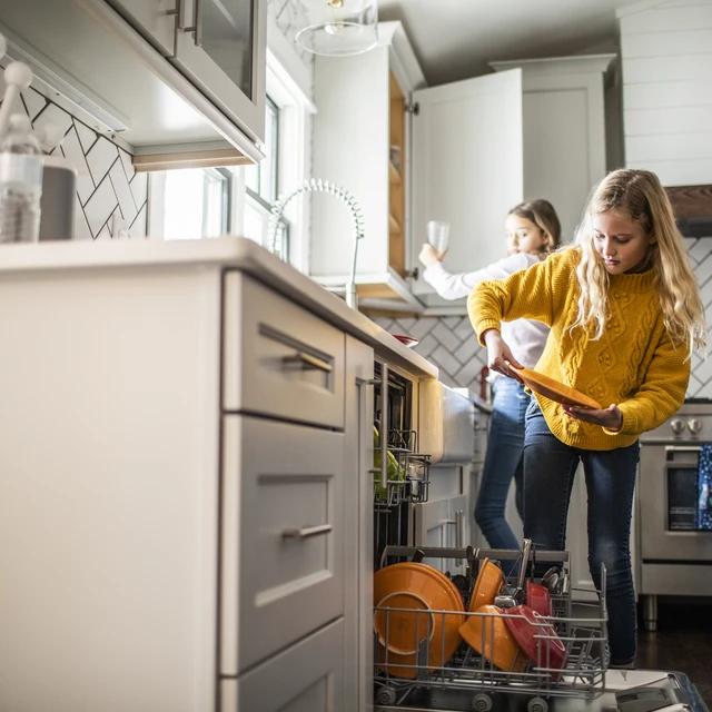 kids loading dishwasher