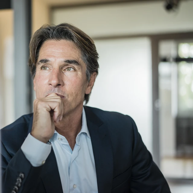 man looking at computer