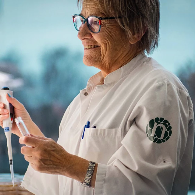 A scientist in a Novonesis laboratory conducting a selective cell count in a yogurt  