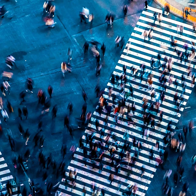 People of all ages and every step of life crossing a street
