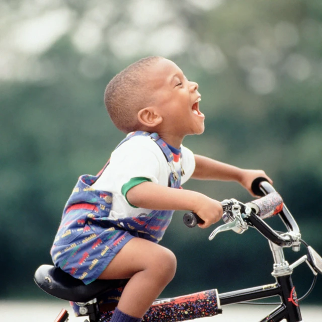 Kid on bicycle