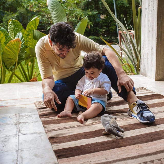 father and child playing