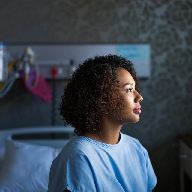 female patient sitting at hospital