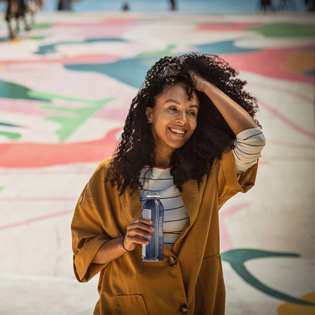 woman drinking yogurt