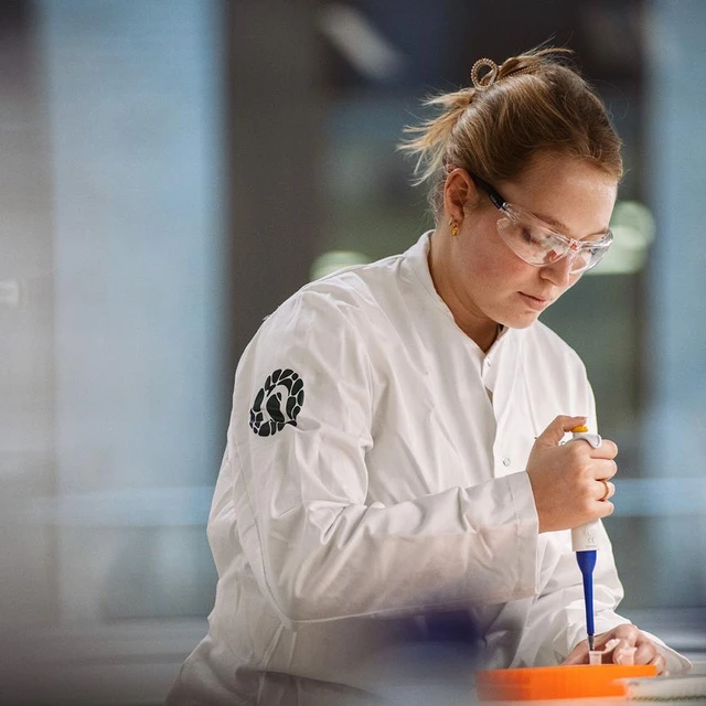 female scientist in lab coat