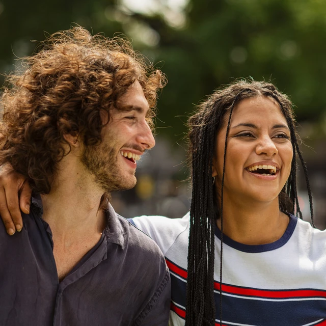 woman and man laughing