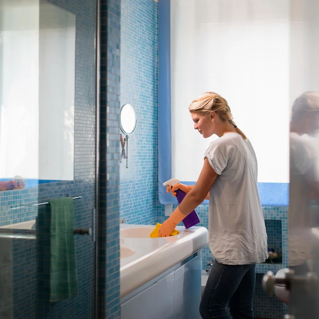 young woman doing chores