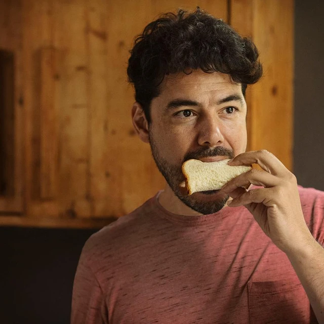 Man eating bread