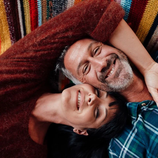 couple smiling on floor