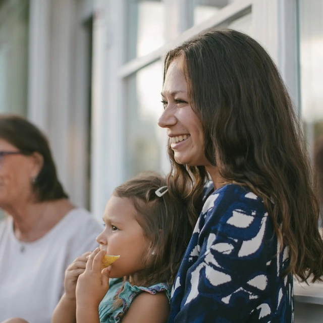 Woman holding daughter