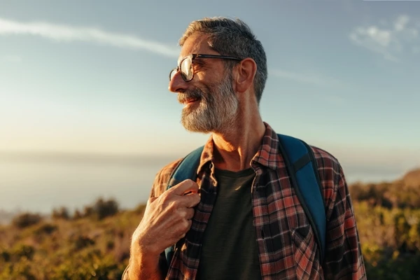 Man hiking in sunset