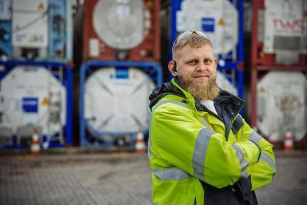 Man in yellow vest in industry