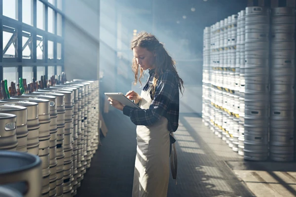 Brewer looking at note