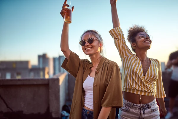 Girls cheering with beer