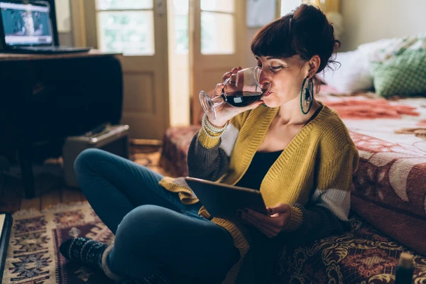 Woman drinking red wine