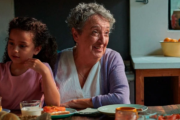 A family sitting by the breakfast table