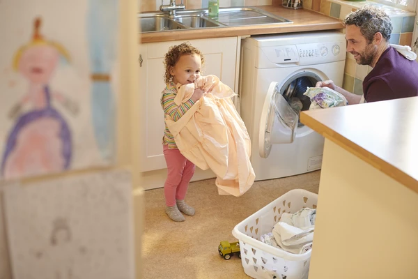 Helping dad with the washing