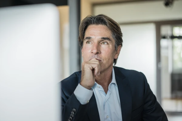 man looking at computer