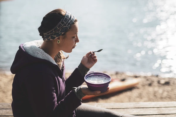 Woman eating healthy food outdoor