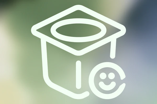 Icon of a yogurt pot with a smiley face, indicating how Novonesis can help fermented milk producers develop products that people love 