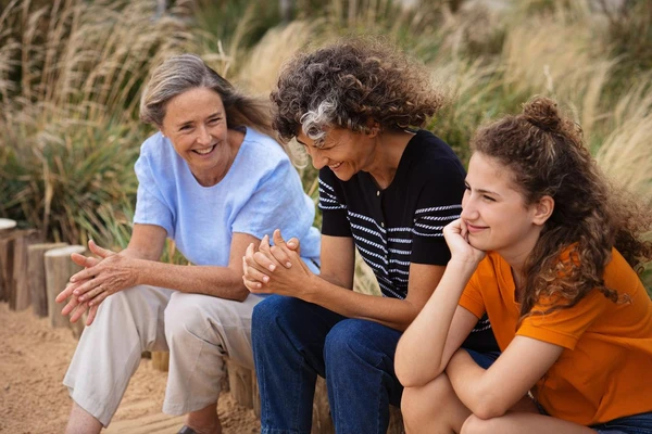 family-laughing-beach
