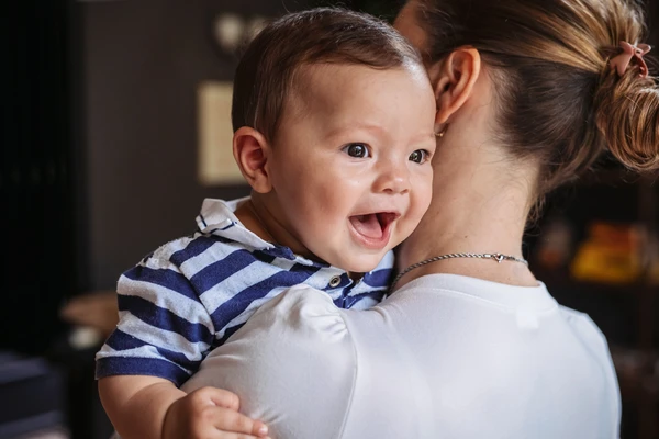 mother baby smile