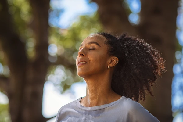 Woman exercising in park