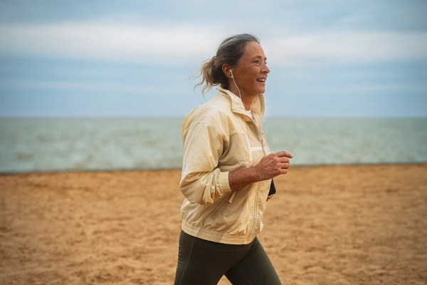 Woman running on beach
