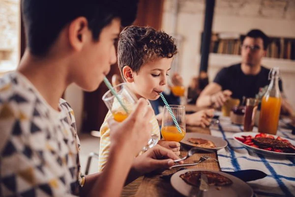 Boys drinking beverages
