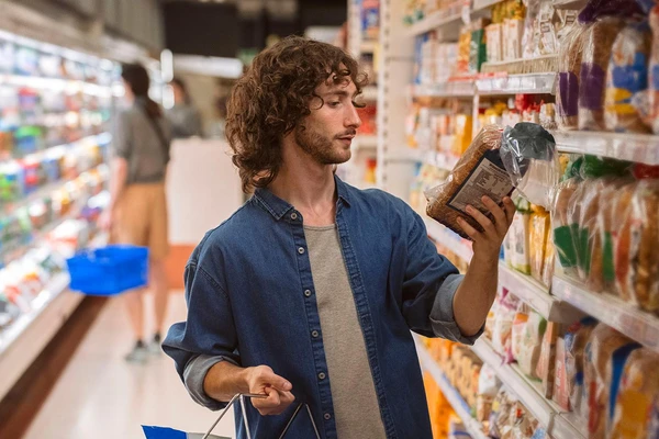 man-shopping-bread-supermarket