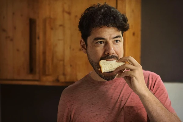 Man eating bread