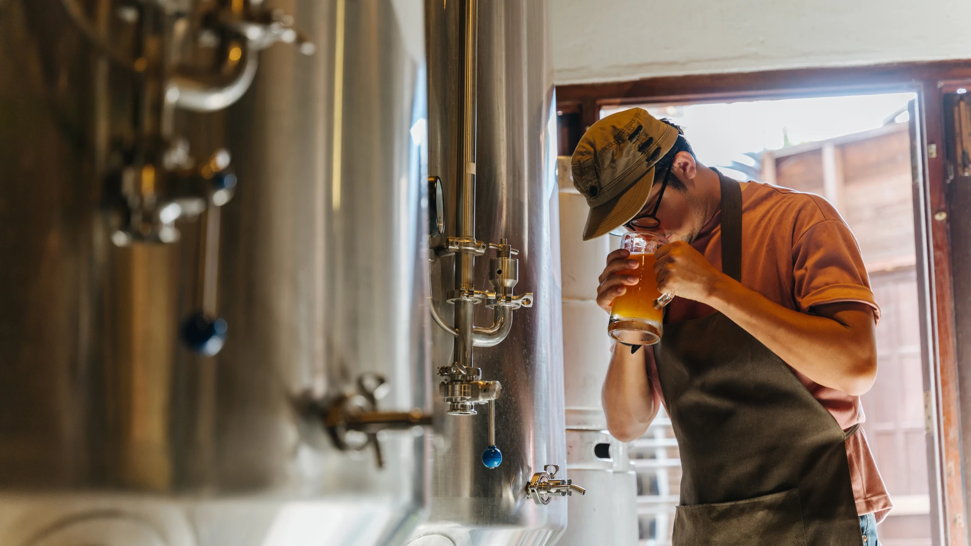 Brewer smelling beer