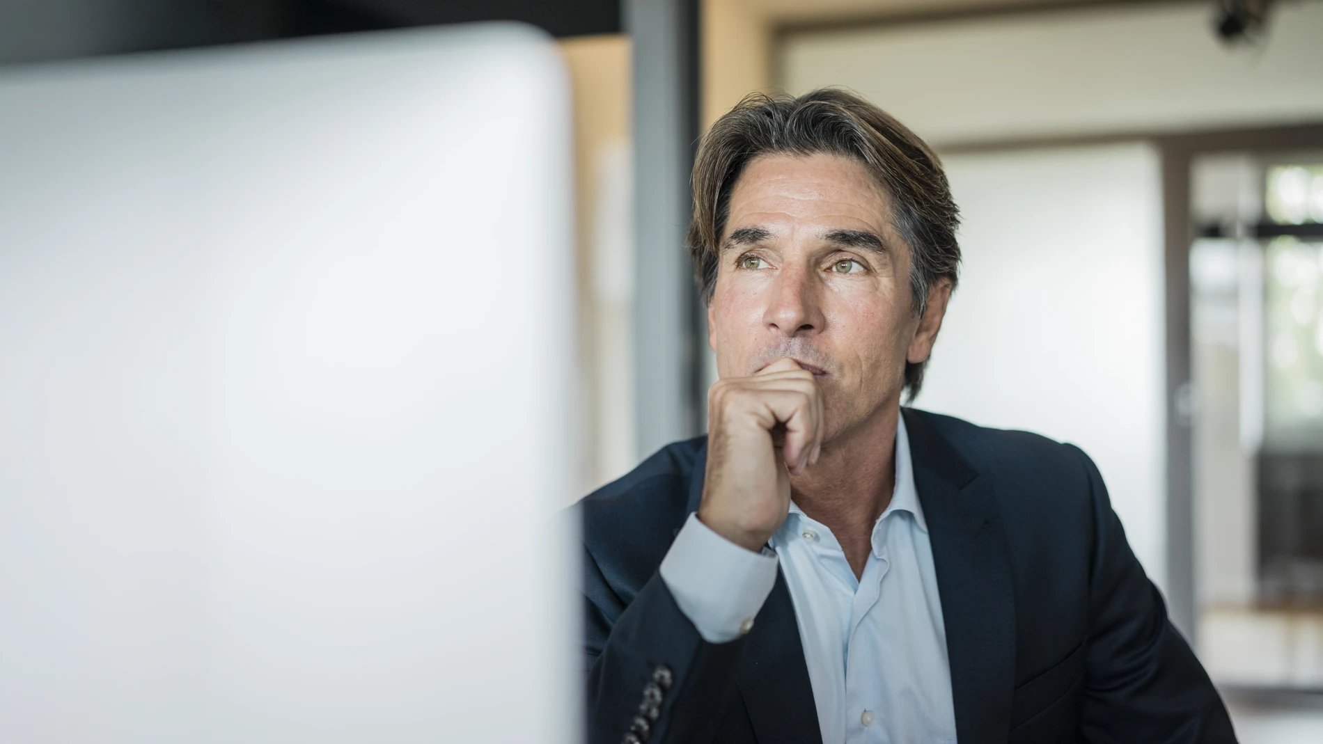 man looking at computer