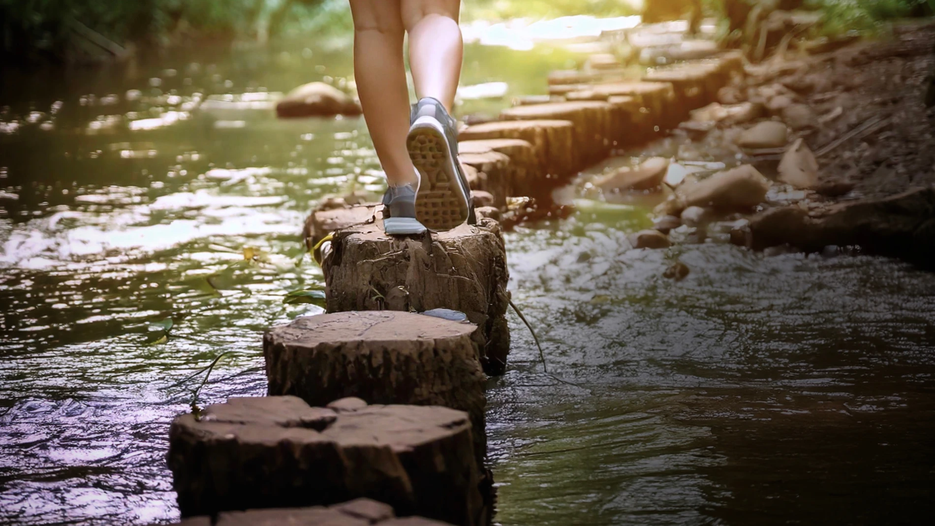 stepping across a river