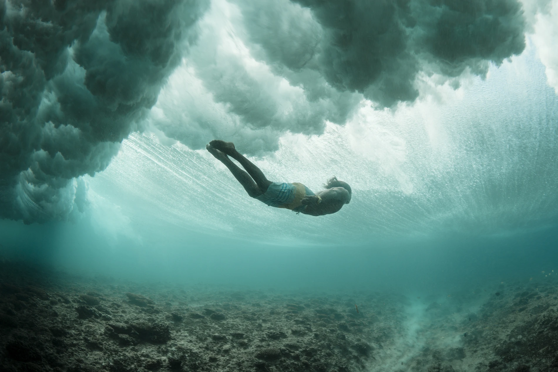 Man diving into wave