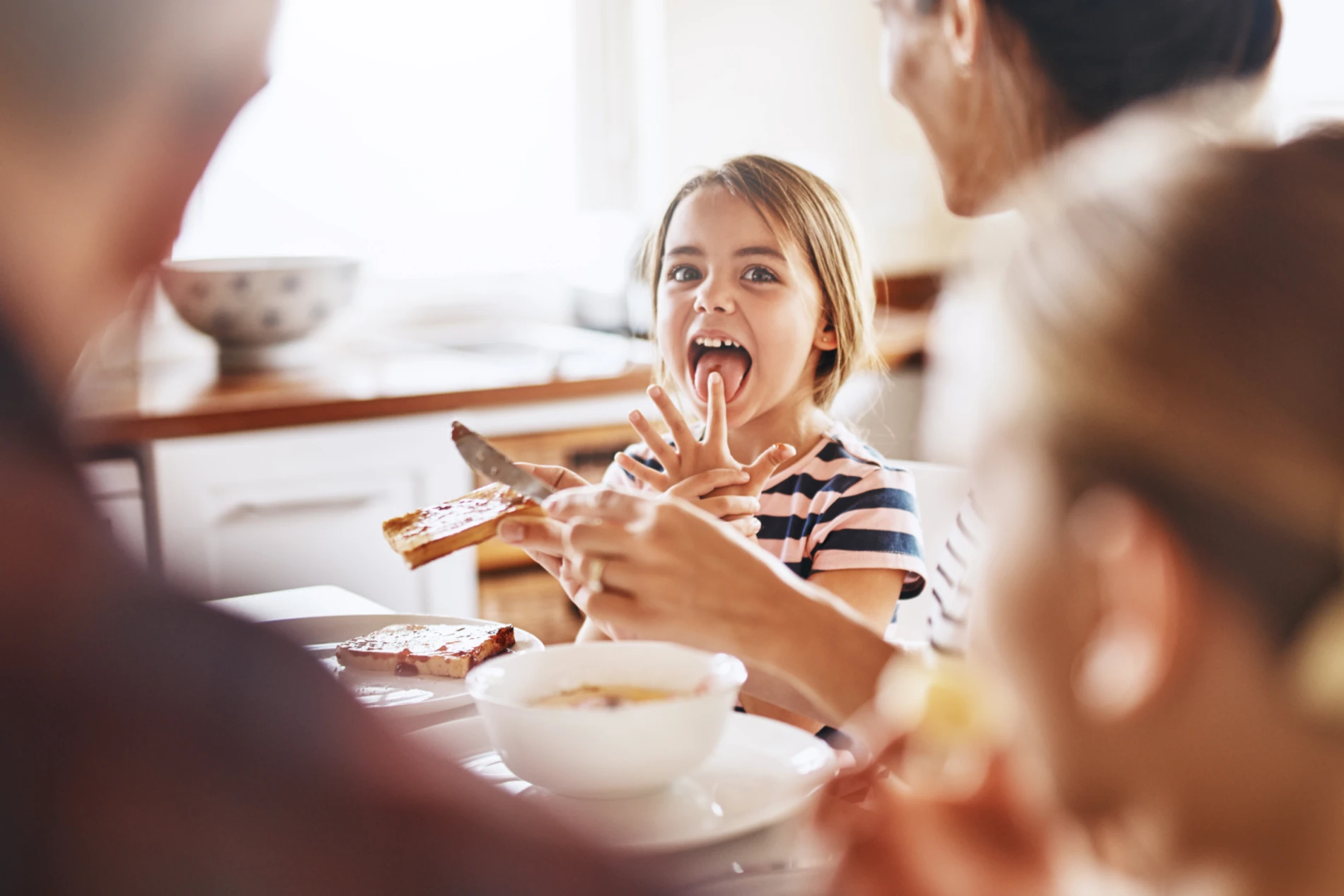 Girl eating bread