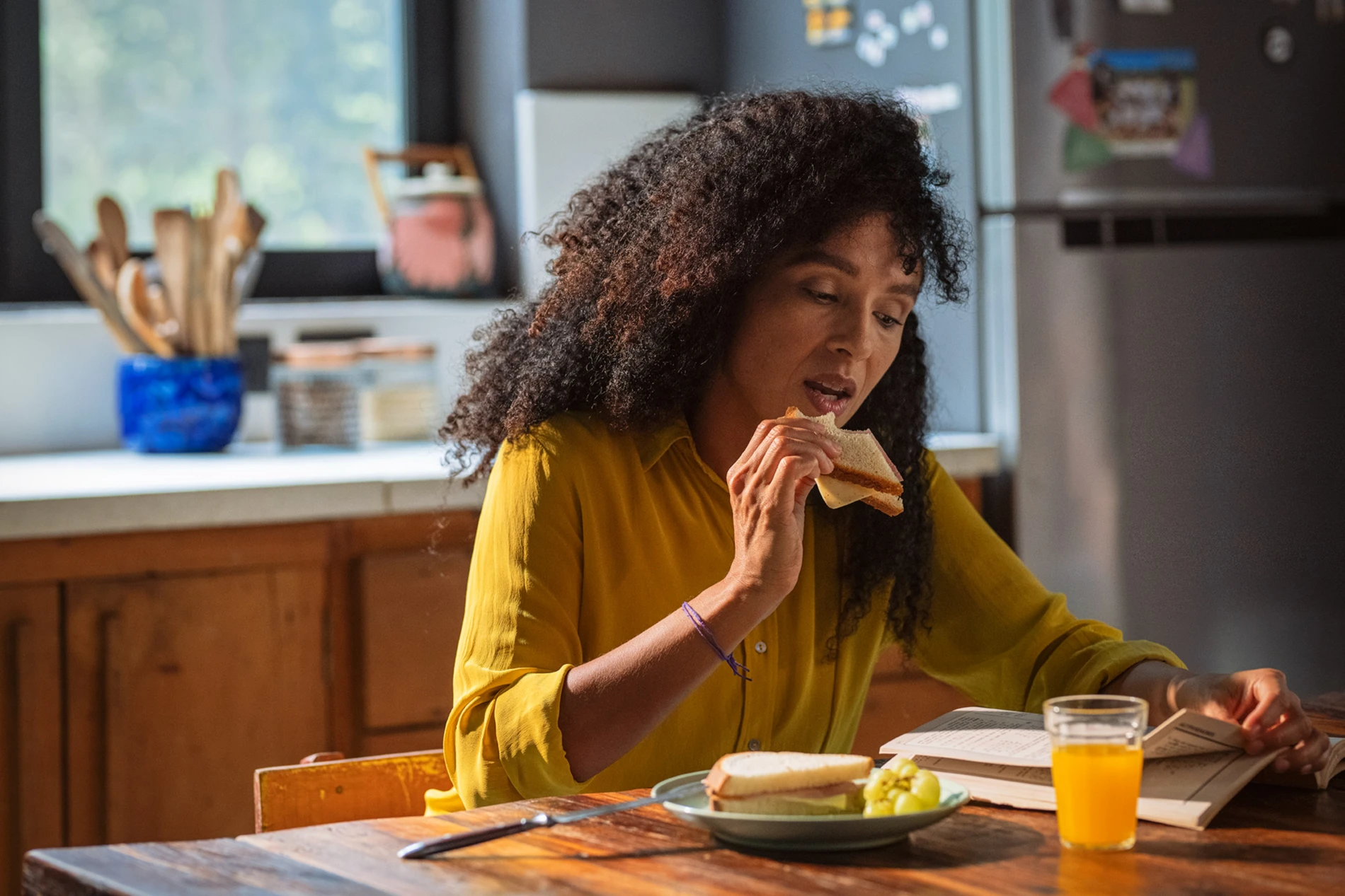 woman eating sandwich