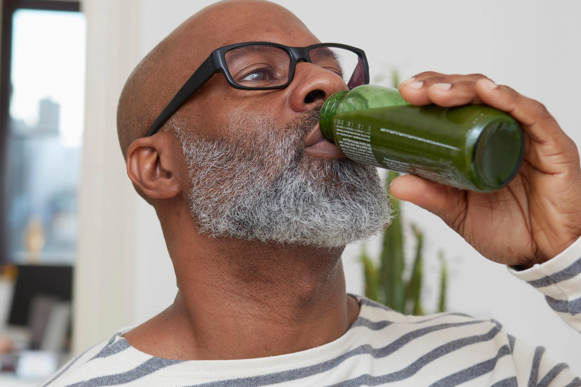 Man drinking smoothie